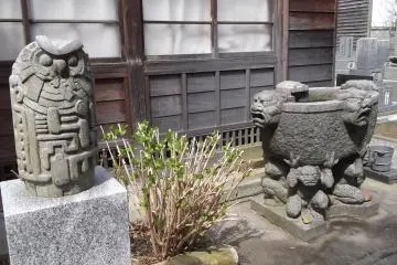 An owl and some gargoyles