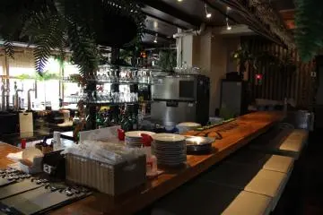 <p>The bar inside Bovino's is a great place to perch at late in the evening</p>