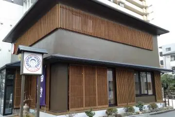 The modern store has a traditional exterior. Spot it easily with the Botchan logo sign!