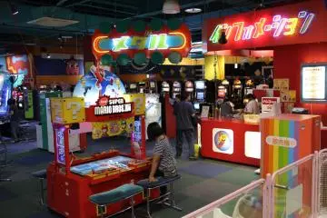 <p>The cavernous back portion of Namco Land contains many slot, playing card and pachinko machines that are for amusement only, there is no gambling at Namco Land</p>