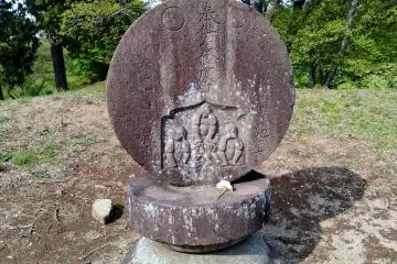 A stone carving of the "Three Wise Monkeys" representing "See no evil, hear no evil, speak no evil". 