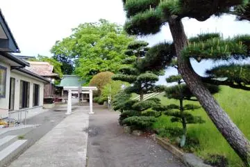 The path to the shrine hugs the bank of the river.