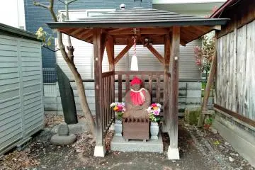 A jizo statue on the precincts. Jizo statues are also sometimes associated with safe travel.