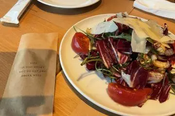 Fresh salad and a motto to live by.