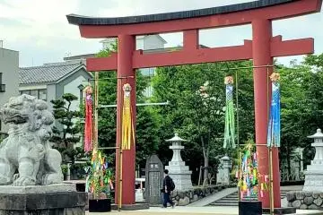 Ni-no-torii decorated with bamboo branches and streamers