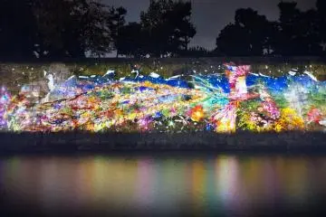 Part of the event includes interactive digital art on the castle's inner moat