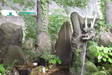 Purify yourself with water from this fierce-looking creature