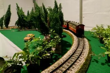 A German toy train set chugged around a track.