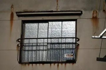 You can see the sign by the window, the light is on when open