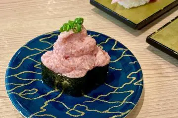 Sushi rolls overflowing with tuna
