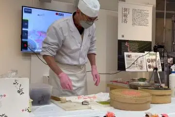 Store owner Kazuo Takada at a wagashi making demonstration
