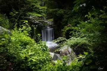 A small waterfall nearby the caves