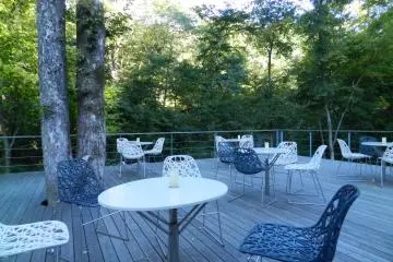 Seats scattered around outside Cafe and Books.
