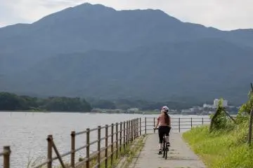 Cycling beside Lake Kamo