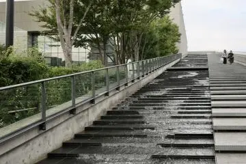 Stairs beside water feature