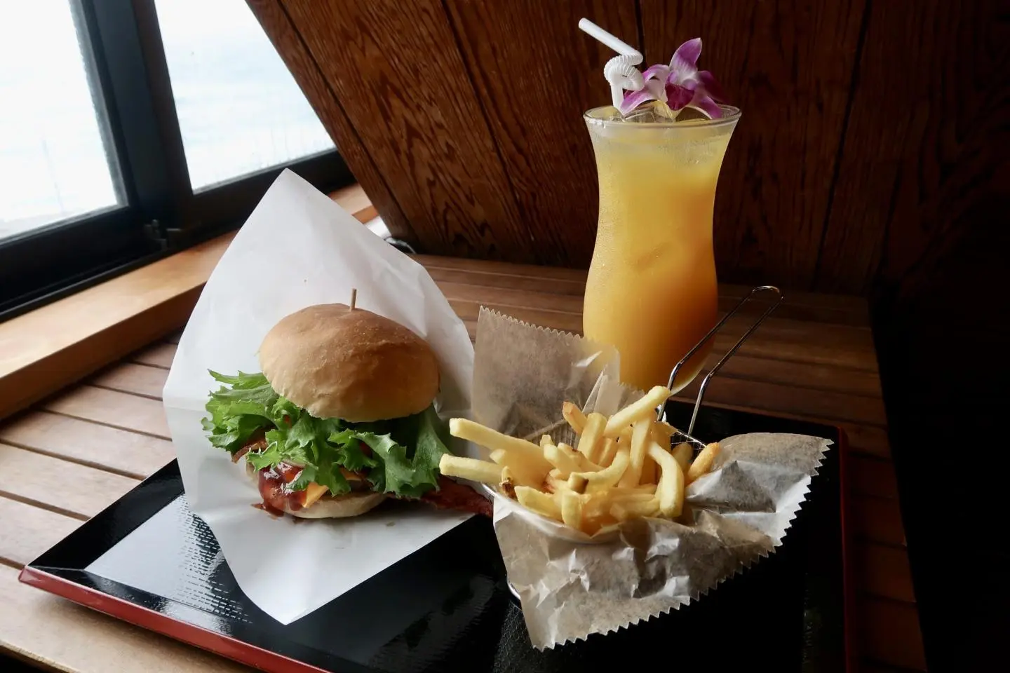 `AILANA burger, fries and mango juice