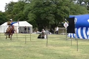 A rider looses a shaft at the target