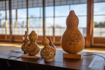 Some of the beautiful gourd lamps created by Ms. Mori