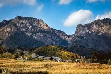 Mukabaki Falls flows between these two mountain peaks