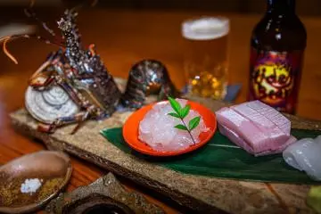 Fresh-caught spiny lobster sashimi served as part of a ten-course meal at the luxurious Takahira-ya inn