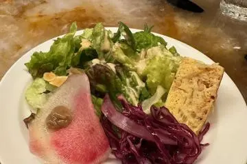 Appetizer salad is complimentary and delicious