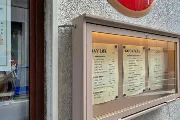 Fuglen is a popular third-wave coffee shop in Tokyo (Photo: <a href="https://unsplash.com/photos/a-sign-on-the-side-of-a-building-that-says-kay-life-ywsEJQ75wCM" target="_blank" rel="noreferrer noopener nofollow">Suzi Kim</a>)