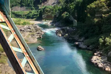 The gleaming emerald water amidst the mountains is an awe inspiring sight