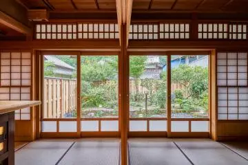 Wall-sized windows and heated tatami floor at Fuji villa