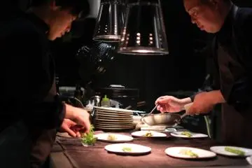Chef Yasuhiko Inoue (right) with an assistant