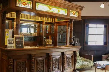 Have a drink by their bar