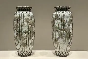 Miyagawa Kozan. Pair of Vases with Insects in Procession on Grape Vines Twining around Bamboo Baskets. 1877, Sannomaru Shozokan, Tokyo