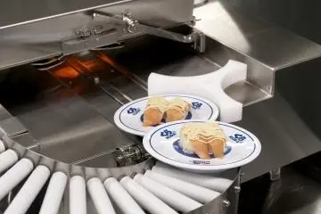 Topnotch technology example: this machine automatically sears sushi (Photo: Kura Sushi)