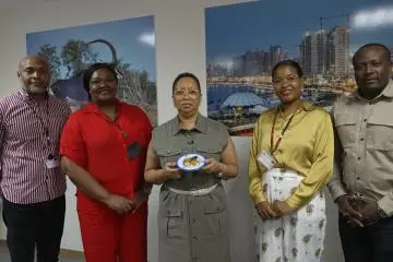 Angolan embassy staff with muamba chicken