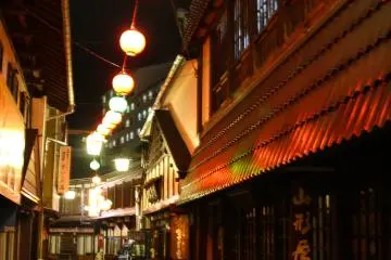 Walk through dazzling streets heralding old time Japan to get to Sai No Kawara Park