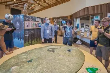 Aya (center right) translating for the group at the Kawayu Visitor Center.