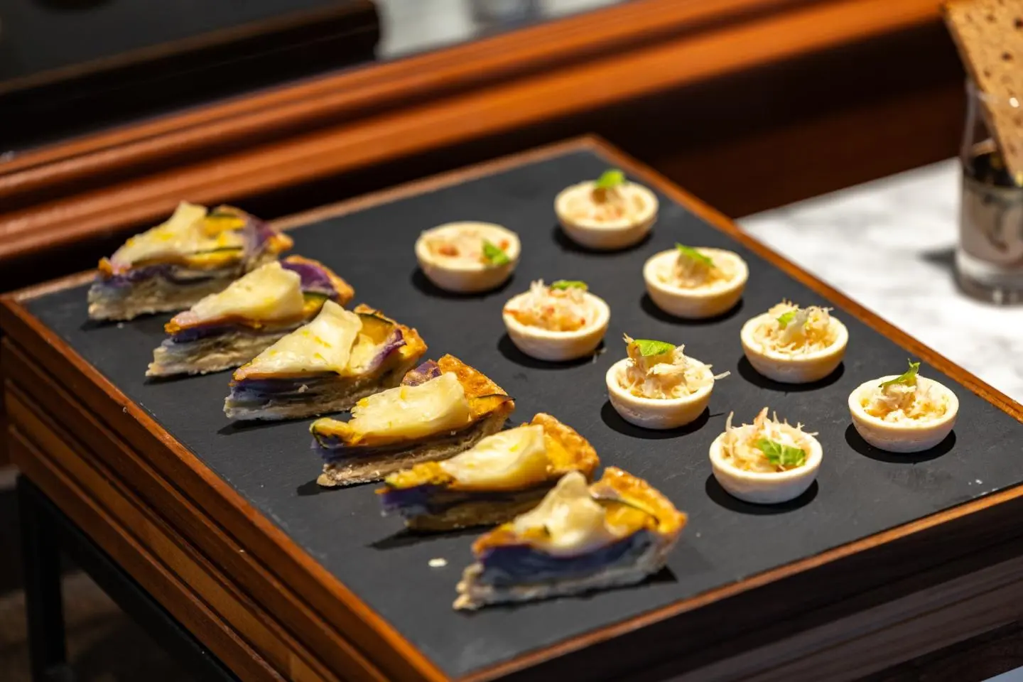 Sweet potato and pumpkin quiches (left) and crab and celery tarts (right) (Photo: Fabien Recoquille)