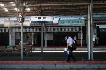 A train attendent arrives for his next shift
