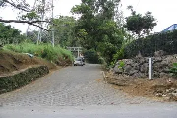 <p>The entrance to the Chibana Castle Site is at the end of this steeply inclining road</p>