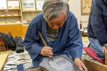 Amehata inkstone making with an artisan