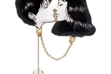 A metal brooch inspired by the story of “The Hanging Balloons”