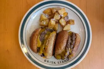 Cut Burger with potato wedges