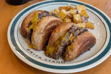 Cut Burger with potato wedges