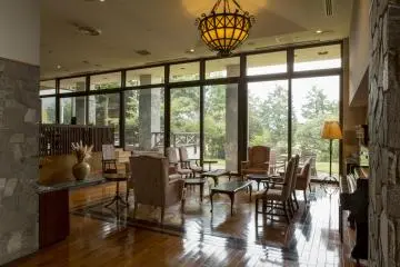The spacious lounge area offers a view over the garden and a place to enjoy the company of you companions