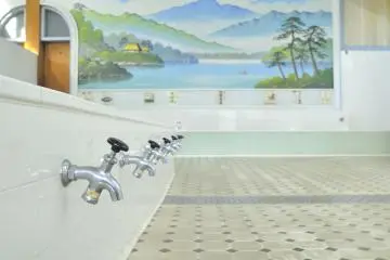 The washing section to the side of a public bath