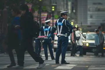 Overall pedestrian safety was one of the attributes that made up city's scores (Photo: <a href="https://unsplash.com/photos/man-in-blue-and-white-police-uniform-standing-on-gray-asphalt-road-during-daytime-NkGGF6BvU88" target="_blank" rel="noreferrer noopener nofollow">Egor Myznik</a> / Unsplash)