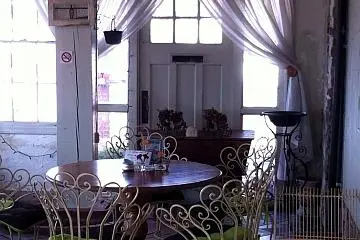 The conservatory overlooking the sea