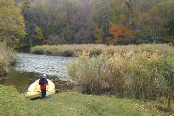Guide ready to raft on the Chitose River