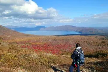 View from Mount Tarumae during a hiking break, sitting on a flat rock
