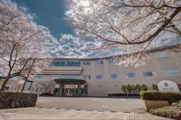 Hotel exterior with cherry blossoms