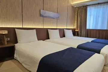 Single beds at Village Kyoto